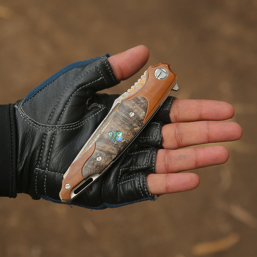 Cuchillo plegable Buck con mango de madera de rosa exótica