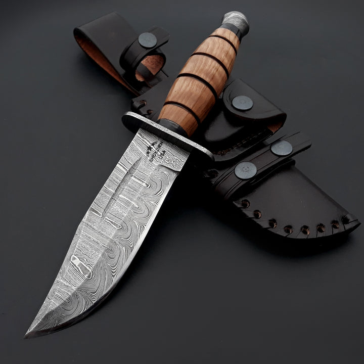 Decorative knife with a wooden handle and leather sheath on a dark background